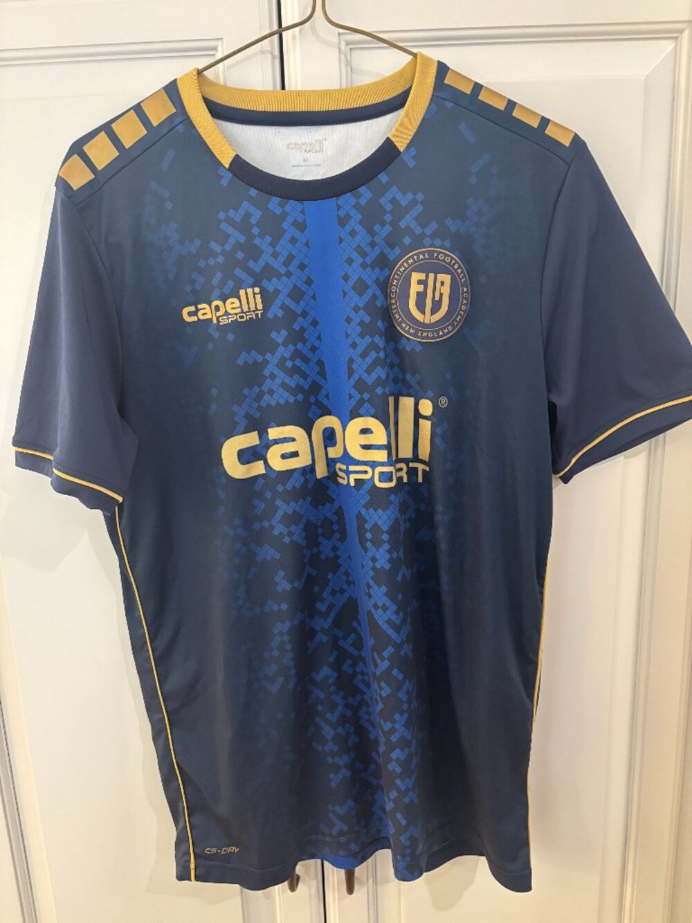 Blue and gold medium capelli soccer jersey